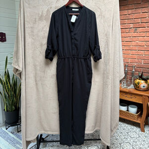Ricki's Black Long Sleeve Jumpsuit Size 8 Timeless Elevated Casual